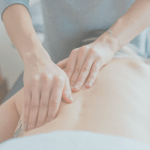 receiving osteopathy treatment